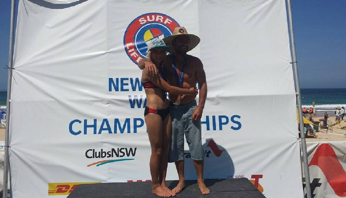 FATHER DAUGHTER: Father and daughter Justin and Lilly Bennett on stage after both winning gold. 