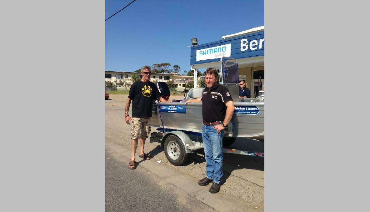 TINNY WINNER: Bermagui CRABs Kingie chapter founder Rob Grimstone and the winner of the tinny, Martin Currie. 