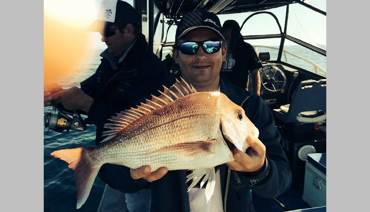 CHARTER SNAPPER: Lee Townsend of BCF Fyshwick with a snapper caught on board Narooma Fishing Charters. 