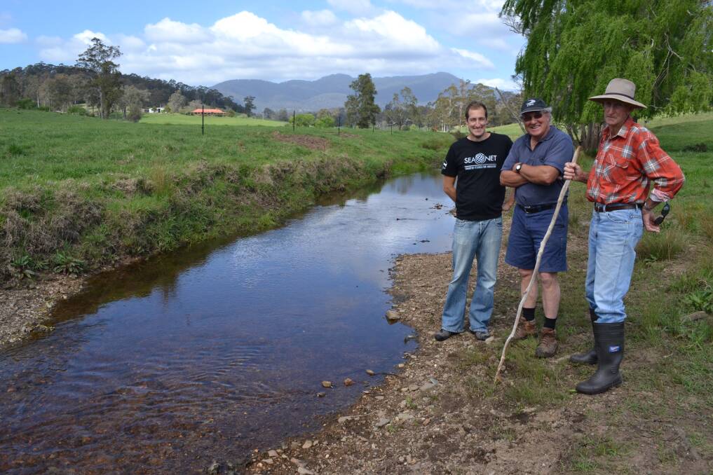 PRISTINE PUNKALLY: OceanWatch project officer Andy Myers, Narooma oyster grower David Maidment and farmer John Costin at the section of Punkally Creek that was recently fenced off from cattle. 