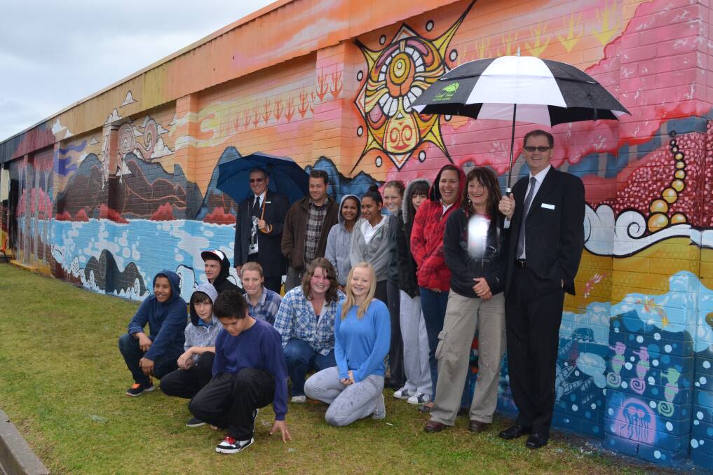 PROUD ARTISTS: The artists included Cobargo Public School- Rodney Kelly, Jared Davis Christian Kelly; Narooma High School- Ben Whiffen, Taylor Richards, Jessica Hunt, Erika Quinn, Christine Franks, Jodie Symons, Tathra Daley, pictured with Narooma High principal Tony Fahey, art teacher and project manager Lin Schroder; Sista Speak students from Narooma High School - Jaydean Lonsdale-Patton, Rhianna Thomas; and mayor Lindsay Brown, as well as writer/artist Tim Phibs. 